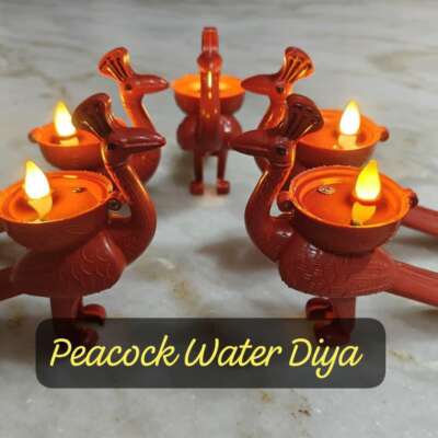Reusable Peacock Water Sensor Diyas